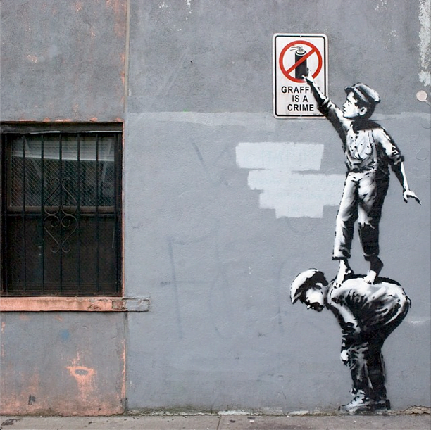 BanksyNYC-Banksy-Graffiti-is-a-Crime-Chinatown-NYC